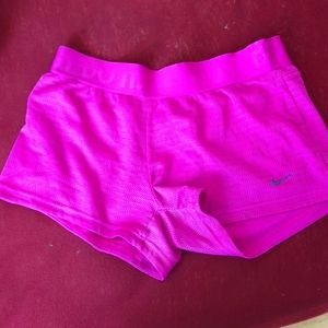 purple Nike shorts